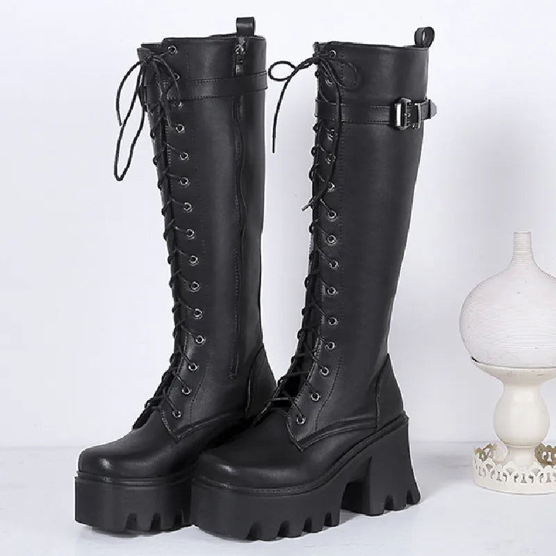 Black PU leather chunky platform knee-high goth punk boots for women with lace-up design, ideal for winter rain wear.