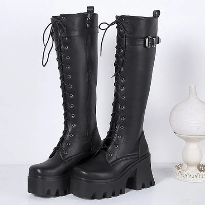 Black PU leather chunky platform knee-high goth punk boots for women with lace-up design, ideal for winter rain wear.