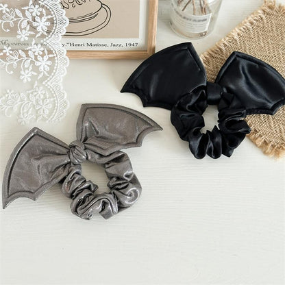 AIUPUOC gothic bat hair scrunchies featuring black headbands and elastic hair ties, ideal for Halloween costumes and fashion.