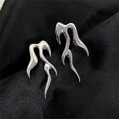Vintage flame-shaped stud earrings in hypoallergenic S925 sterling silver, lightweight gothic punk jewelry for cosplay or Halloween.