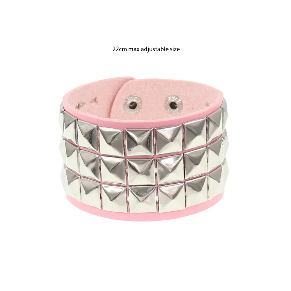 Black leather cuff bracelet with metal rivets, gothic punk style, unisex accessory for men and women.
