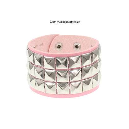 Black leather cuff bracelet with metal rivets, gothic punk style, unisex accessory for men and women.