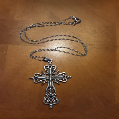 Gothic cross pendant necklace with dark punk style jewelry for men and women, featuring intricate cross design on a chain.