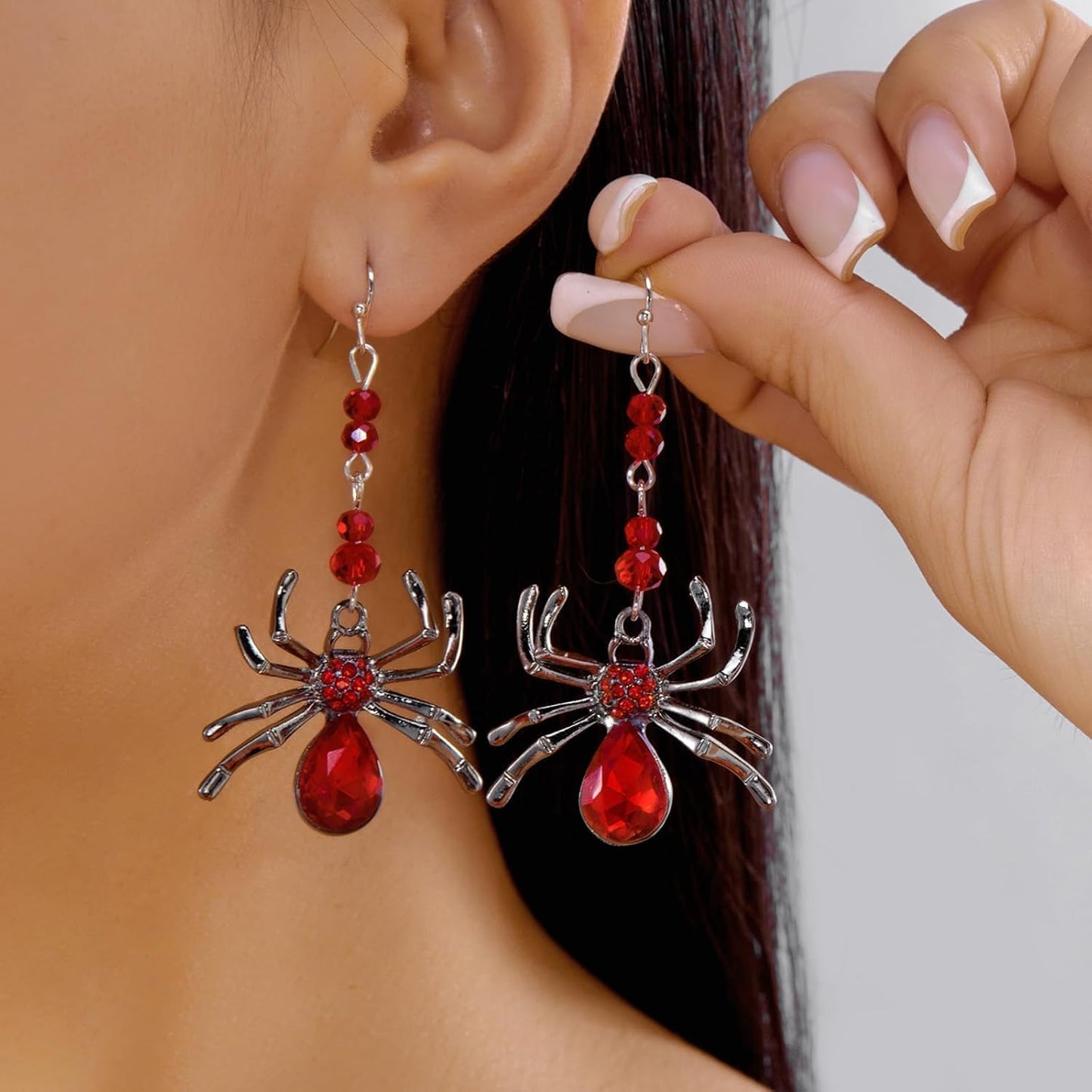 ULLKEL Gothic spider bat and witch hat earrings featuring spooky charms, ideal statement jewelry for cosplay and alternative fashion.
