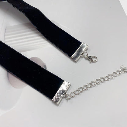 Black velvet princess choker necklace by Cykdohy featuring a Victorian crystal cameo, perfect gothic steampunk jewelry.
