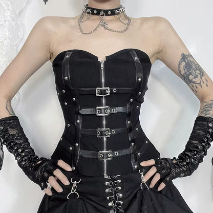 Black leather punk grunge corset top with buckle straps, edgy Y2K coquette gothic streetwear vest, worn by a model.