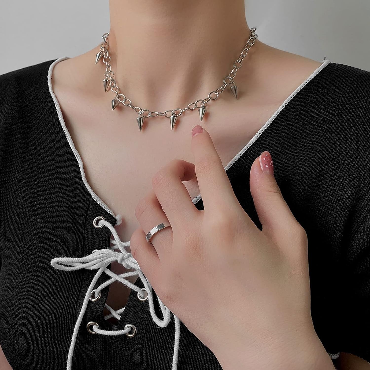 Tosmifairy punk rock stainless steel choker necklace with spikes, 7-piece Y2K goth jewelry set, featuring edgy, spiked design elements.