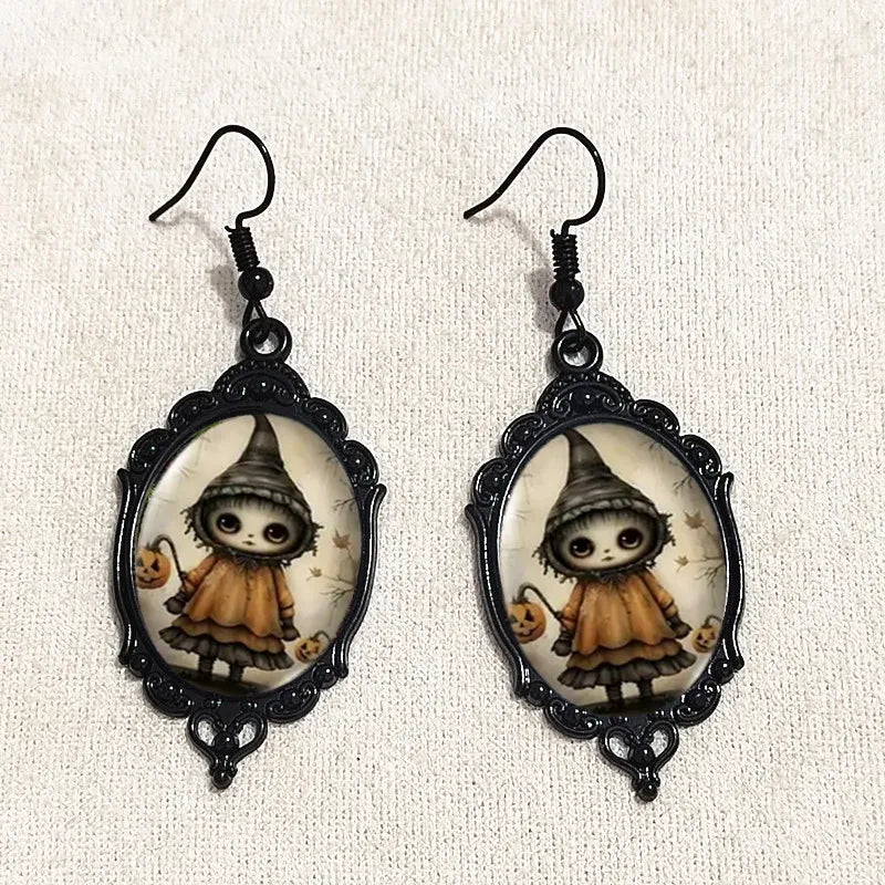 Gothic witch cameo dangle earrings with vintage crystal glass, Victorian punk style jewelry featuring dark, intricate design elements.
