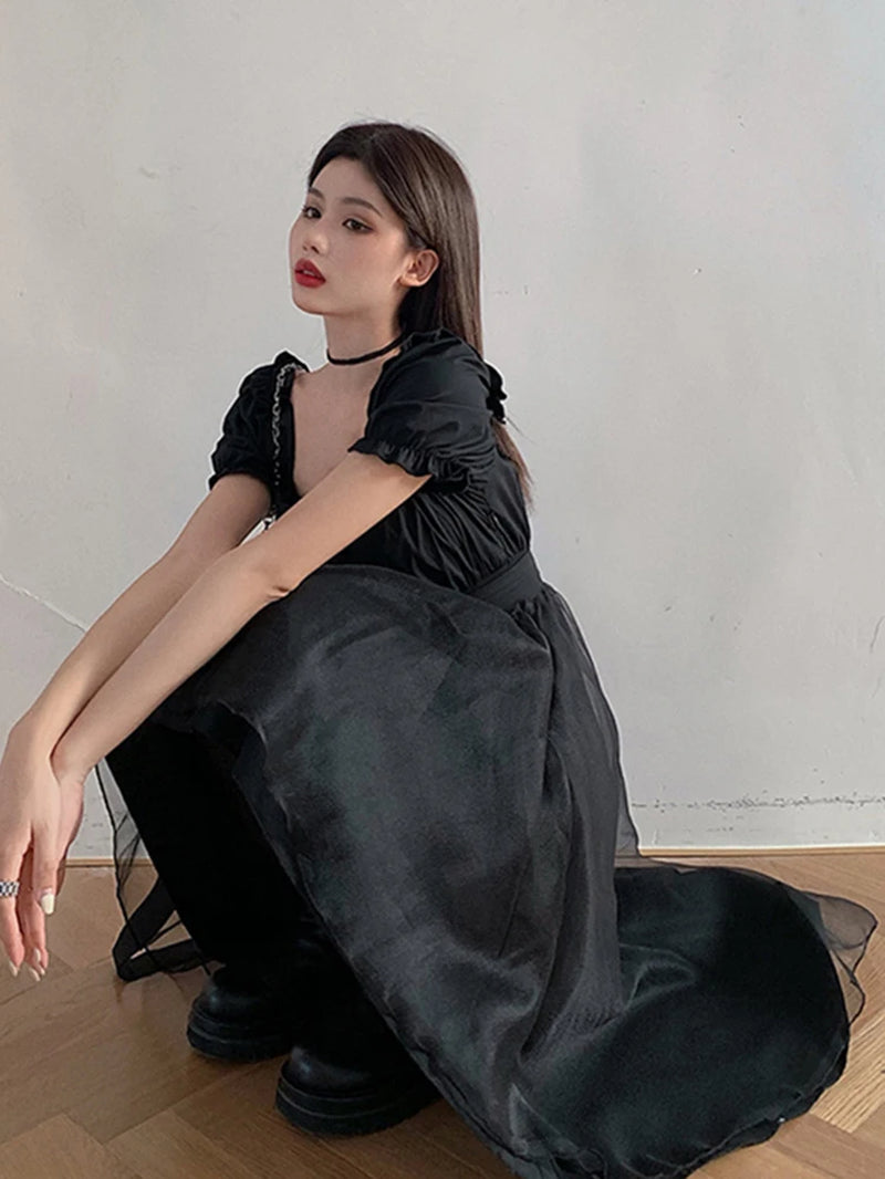 Y2K Harajuku Gothic dress by PressureDen.store featuring ruffles, mini length, perfect for E-Girl, Kawaii, and Fairycore fashion styles.