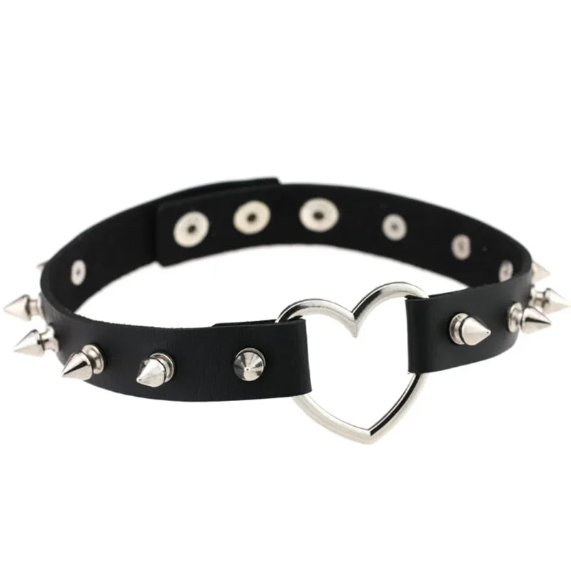 Black PU leather choker with heart rivets, Y2K goth punk necklace from PressureDen.store, featuring trendy edgy jewelry for girls.