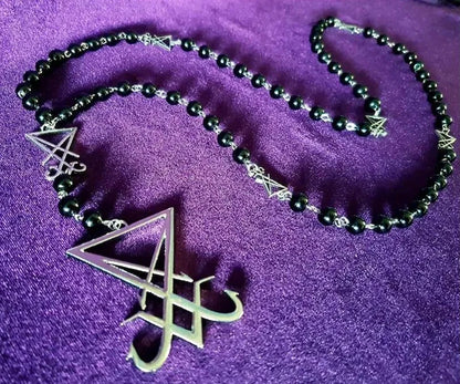 Luciferian Sigil Rosary Necklace, gothic occult jewelry featuring dark metal beads and a pendant, suited for the Left Hand Path.