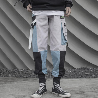 Men's tactical techwear harem pants by PressureDen in blue, featuring cargo pockets and cyberpunk-inspired jogger style, size XL.