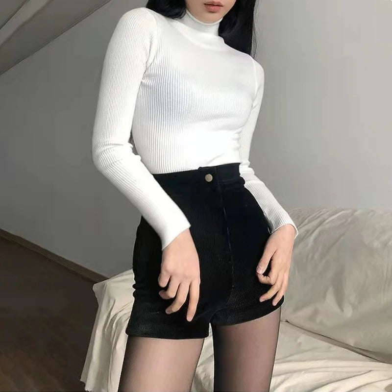 Black high-waisted goth shorts for women featuring stretch corduroy fabric, casual Y2K-inspired fashion pants by PressureDen.