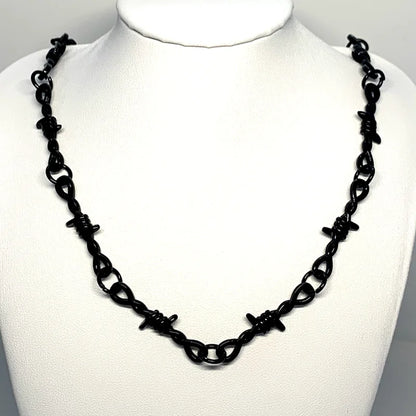 Gothic heart choker necklace with barbed wire design, hip-hop inspired jewelry for women, PressureDen.store accessory.