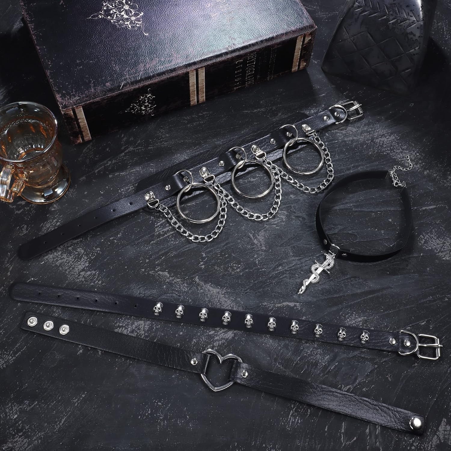 HAIAISO punk goth choker necklace set with 6-9 adjustable black PU collars featuring heart spikes for bold women.