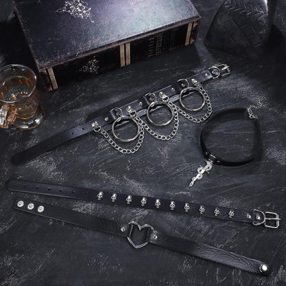 HAIAISO punk goth choker necklace set with 6-9 adjustable black PU collars featuring heart spikes for bold women.
