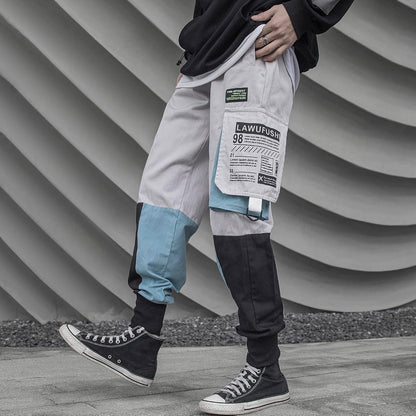 Men's tactical techwear harem pants in blue, stylish cyberpunk joggers and cargo sweatpants, size XL, featuring multiple pockets and modern design.
