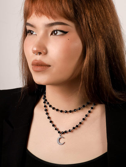 Black gothic layered crescent moon choker necklace by Sacina, featuring a stylish and intricate design for a striking jewelry look.