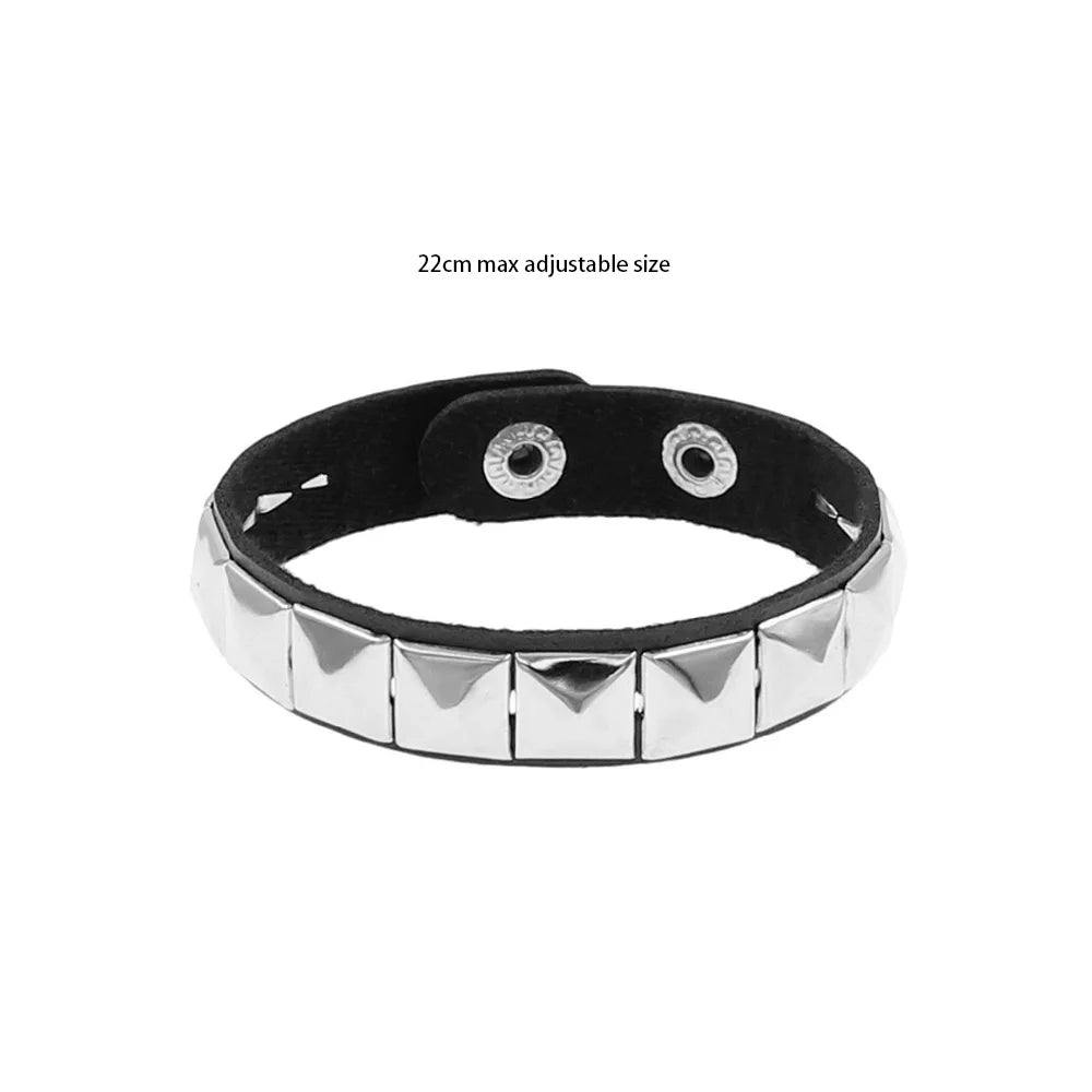 Black leather cuff bracelet with metal rivets, gothic punk style for men and women, featuring a bold, edgy design.