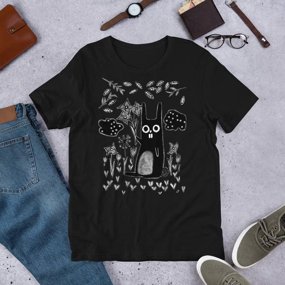 Whimsical Garden Rabbit T-Shirt by PressureDen.store featuring a quirky gothic emo design, perfect for birthdays and housewarmings.