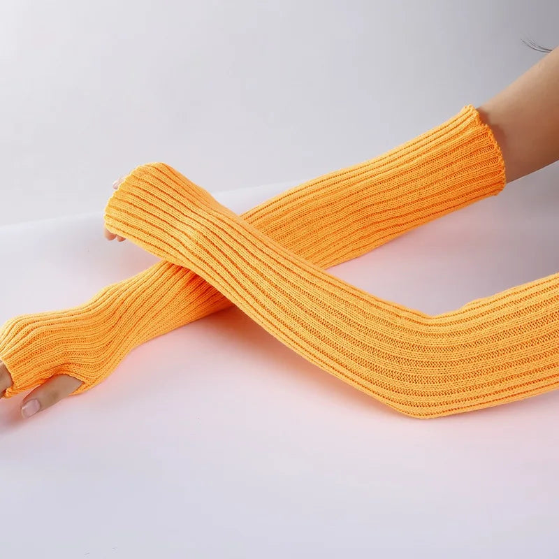 Chic long fingerless winter gloves for women, soft knitted arm warmers with a casual gothic punk style, perfect for cold weather.