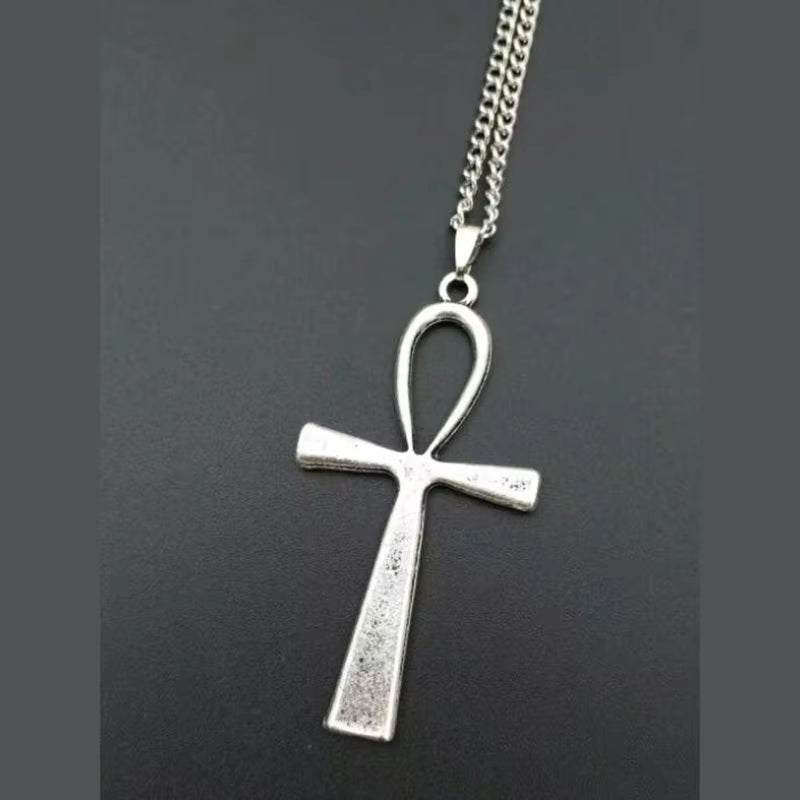 Y2K aesthetic razor blade pendant necklace in silver, edgy vintage punk goth jewelry for men and women.