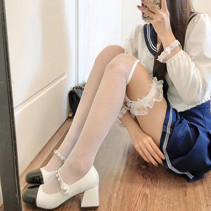 Black mesh thigh-high stockings with bowknot, Gothic Y2K Harajuku style, sexy long socks for Lolita cosplay and alternative fashion.