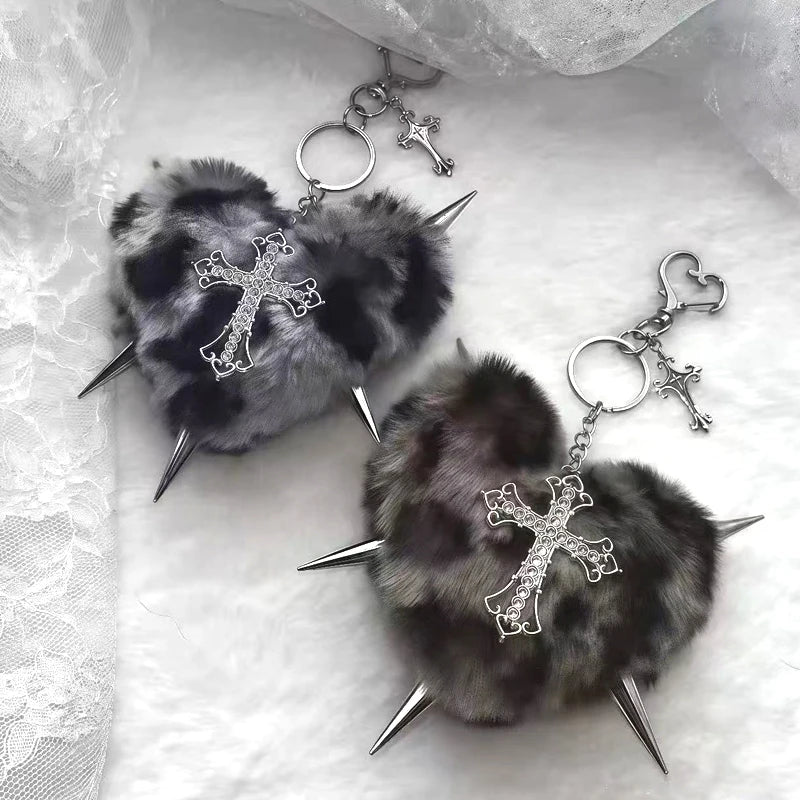 Leopard print punk rock rivet cross keychain with heart detail, goth style accessory for bags and keys.