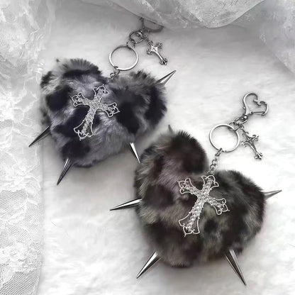 Leopard print punk rock rivet cross keychain with heart detail, goth style accessory for bags and keys.