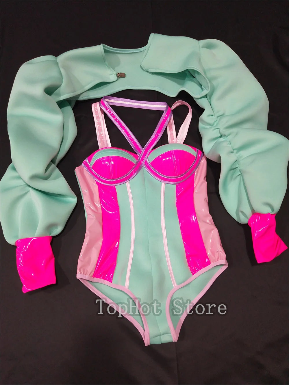 Vibrant Pink and Green Color-Blocked Bodysuit with Bold Bubble Sleeves for Dazzling Drag Performances and Nightclub Nights