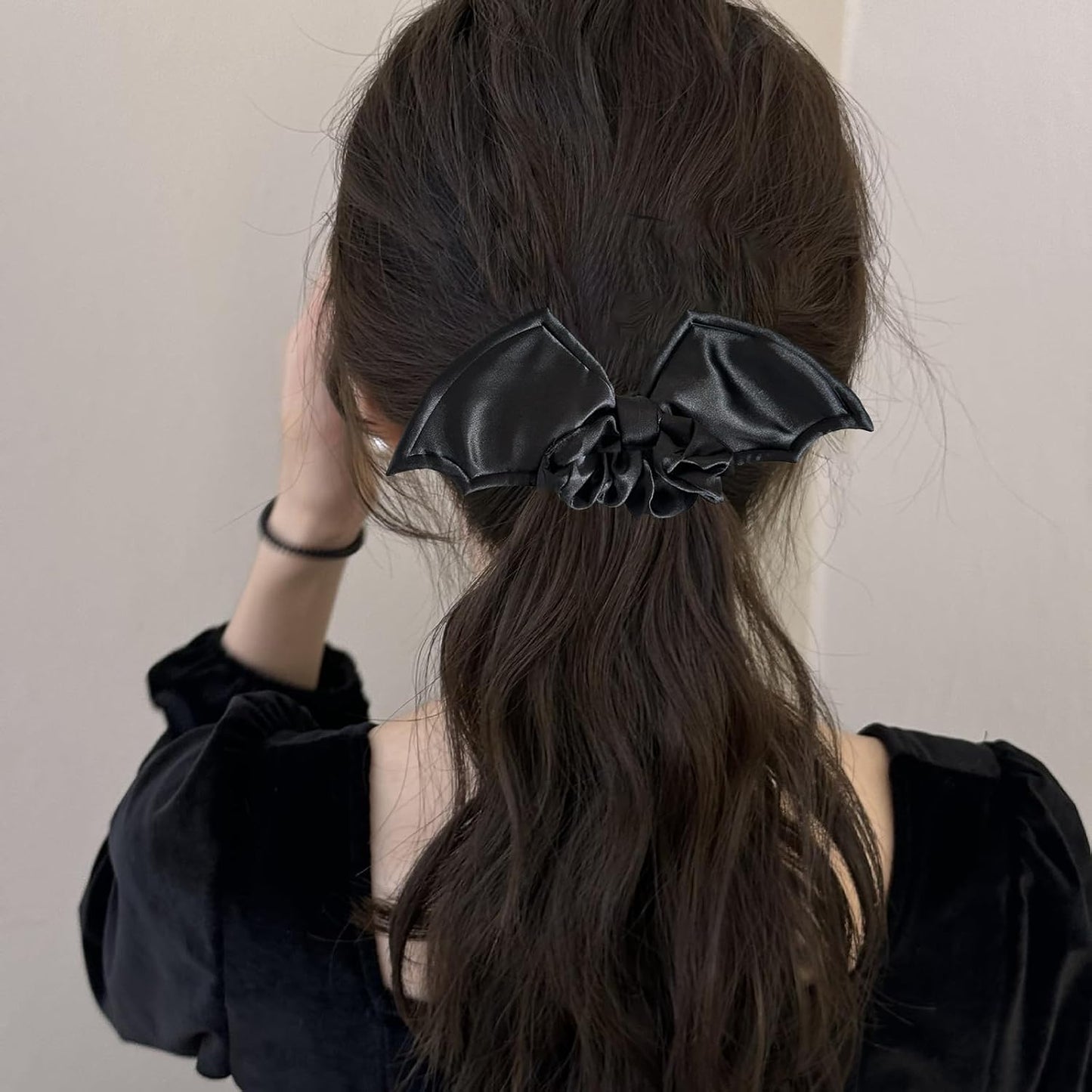 Black gothic bat hair scrunchies by AIUPUOC with bat designs, elastic hair ties ideal for Halloween and gothic fashion styles.