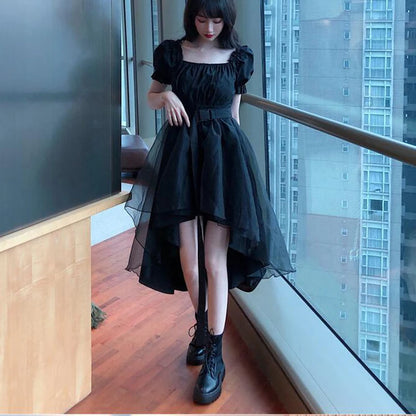 Black Y2K Gothic dress by PressureDen.store featuring ruffles, mini length, and Harajuku style for Kawaii and Fairycore fashion.