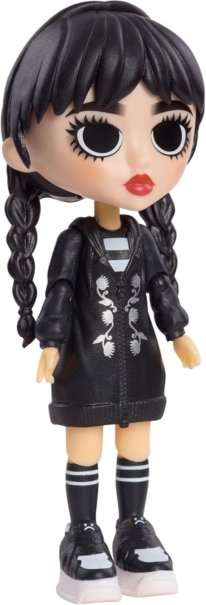 WEDNESDAY Deluxe 6-Inch Articulated Figure, 11-Pieces, Interchangeable Face Plates and Fashion, Customizable Collectible Figurine, Kids Toys for Ages 3 up by