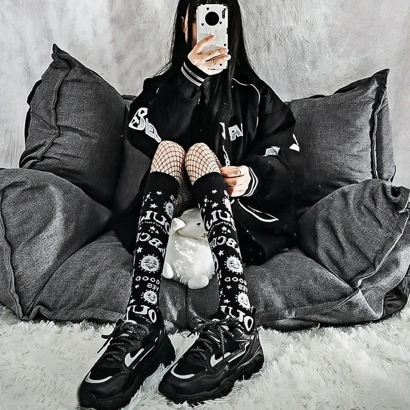 Gothic punk Harajuku star and moon knee socks with retro Y2K Ouija board design for women and girls, featuring black and white patterns.
