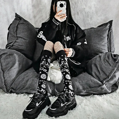 Gothic punk Harajuku star and moon knee socks with retro Y2K Ouija board design for women and girls, featuring black and white patterns.