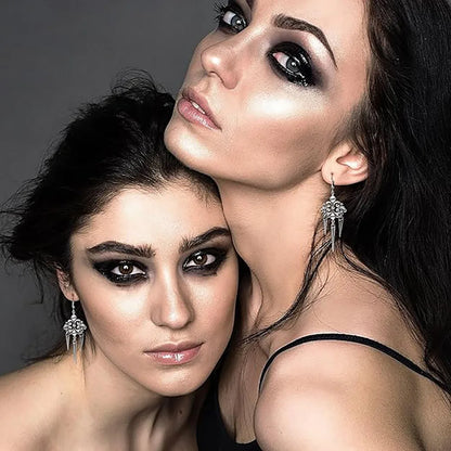 Hypoallergenic drop dangle earrings featuring gothic punk Y2K style for women, with edgy metallic design and intricate detailing.