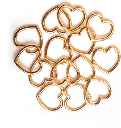 Vintage heart waist chain by FNQUFUJ, adjustable body jewelry worn with dresses or jeans, featuring a charming heart design.