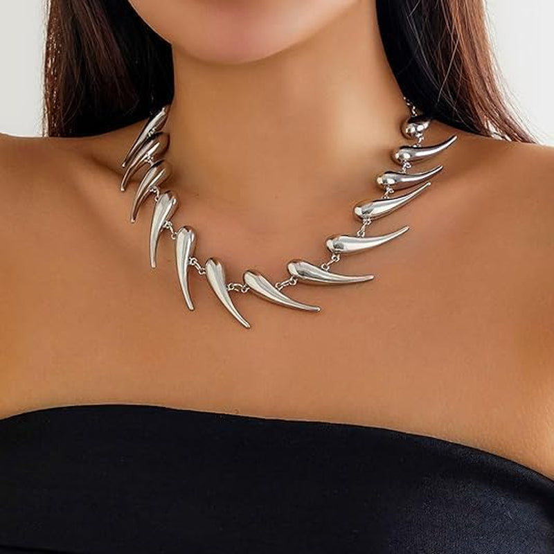 Edgy handmade silver spike choker necklace by CheeseMine, adjustable punk goth collar with sharp spike details.