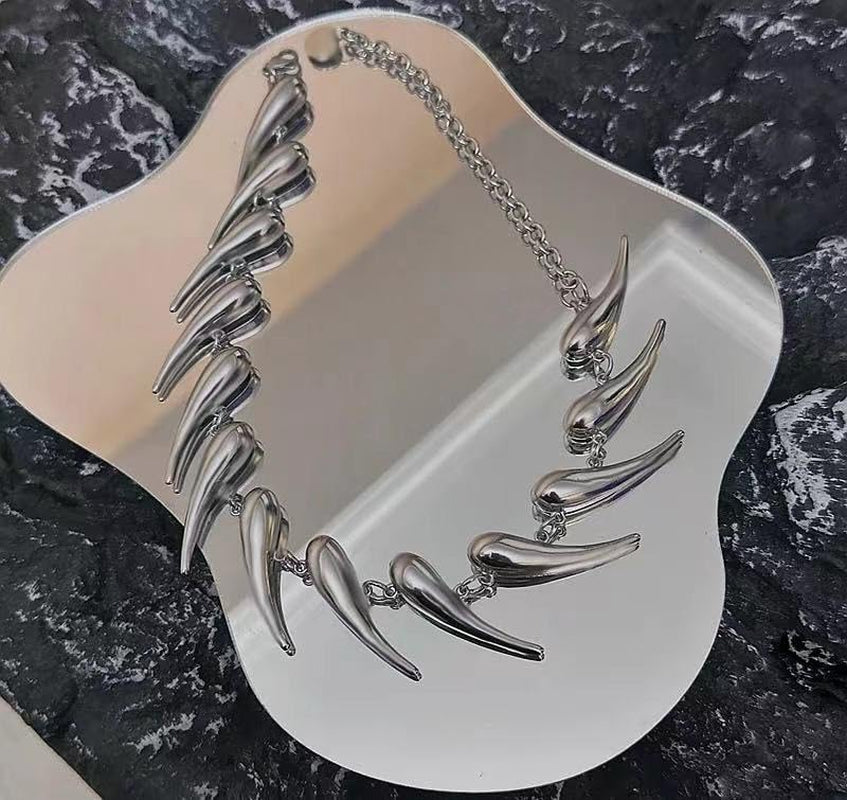 Handmade silver spike choker necklace by CheeseMine featuring an adjustable punk goth collar with edgy spike details.