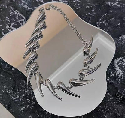 Handmade silver spike choker necklace by CheeseMine featuring an adjustable punk goth collar with edgy spike details.