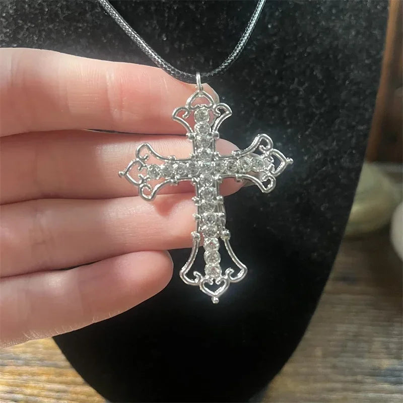 Rhinestone cross choker necklace with spiral design, gothic punk style jewelry for women, featuring sparkling rhinestones and bold fashion statement
