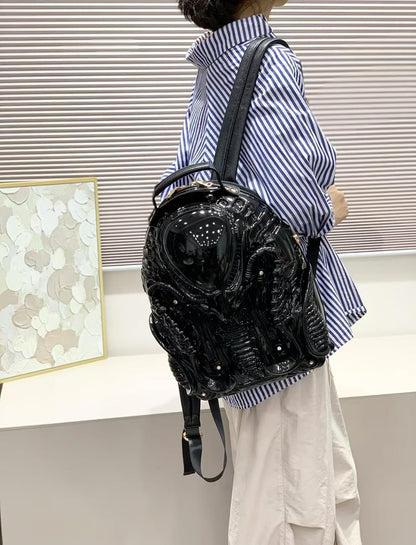 Men's Goth Alien Y2K Xenomorph backpack by CerfoParlen, stylish black outdoor bag featuring a futuristic alien design.