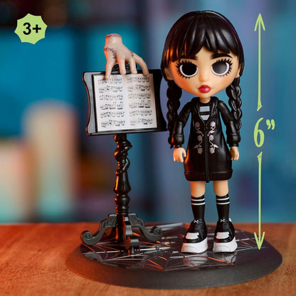 WEDNESDAY Deluxe 6-Inch Articulated Figure, 11-Pieces, Interchangeable Face Plates and Fashion, Customizable Collectible Figurine, Kids Toys for Ages 3 up by