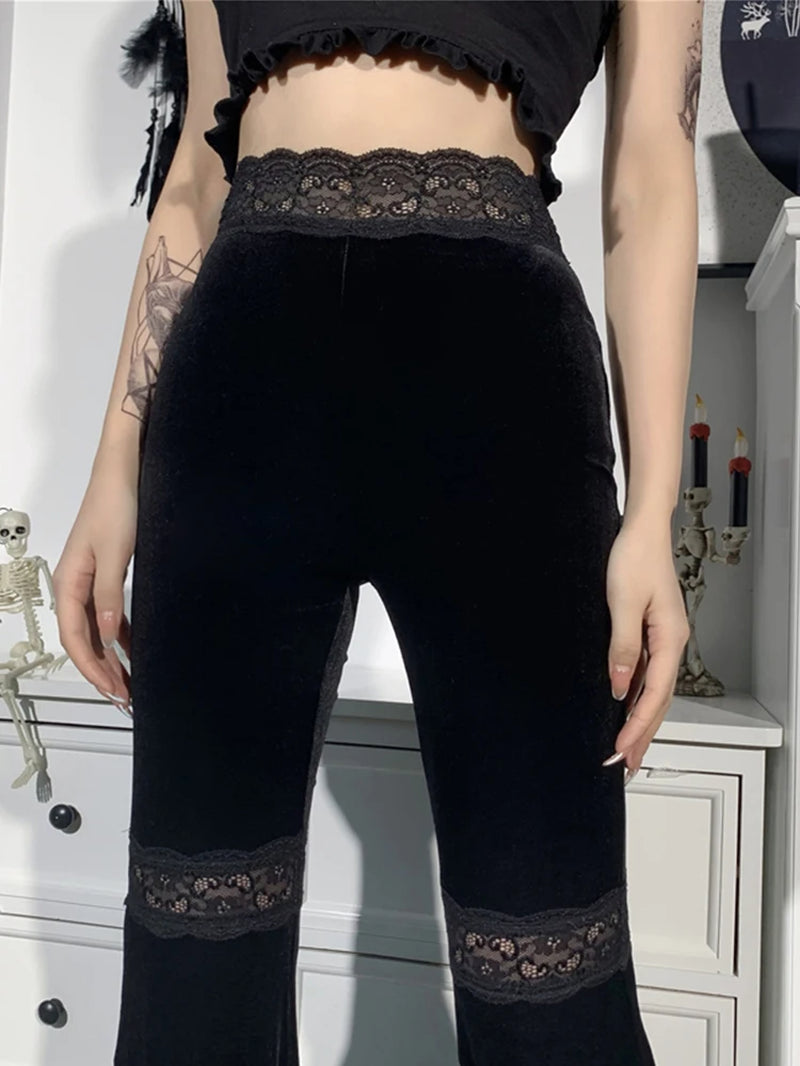 Dark black velvet flare pants by PressureDen.store featuring lace patchwork and hollow out details in edgy Harajuku punk Gothic style.