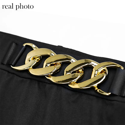 Black maxi skirt with tassel details and ring belt, ideal for punk, gothic, and grunge fashion styles.