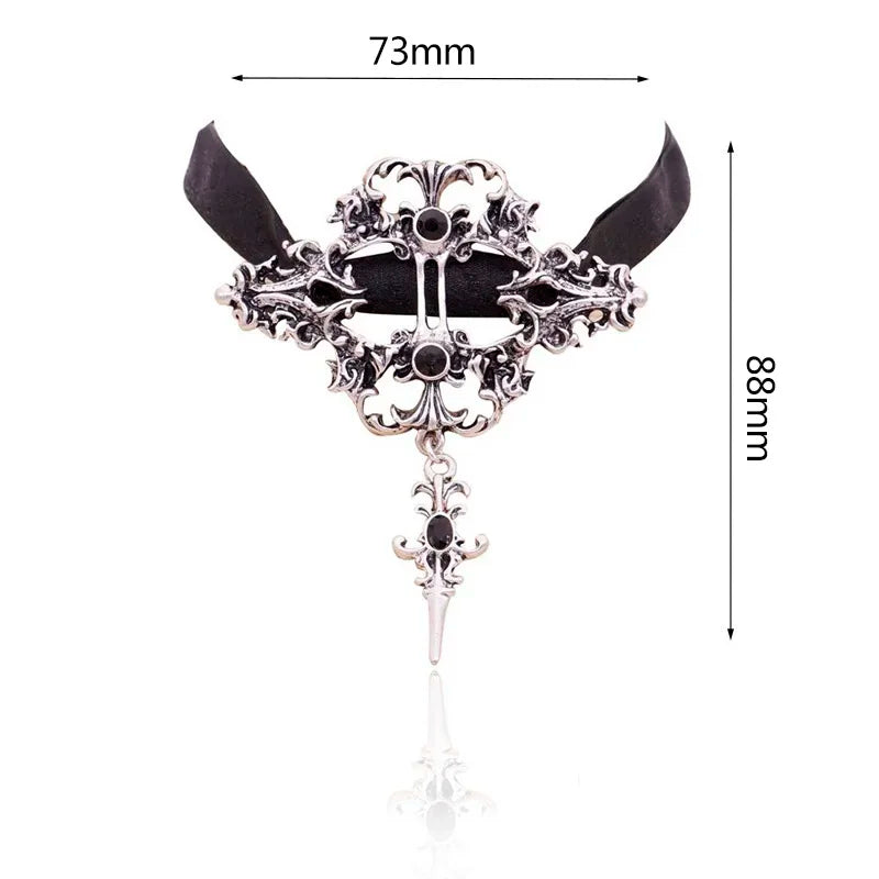 Gothic dragon bat eagle heart rose pendant necklace featuring detailed metalwork, worn by a person with dark clothing.