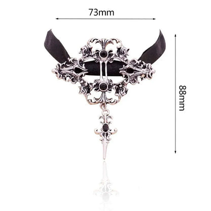 Gothic dragon bat eagle heart rose pendant necklace featuring detailed metalwork, worn by a person with dark clothing.