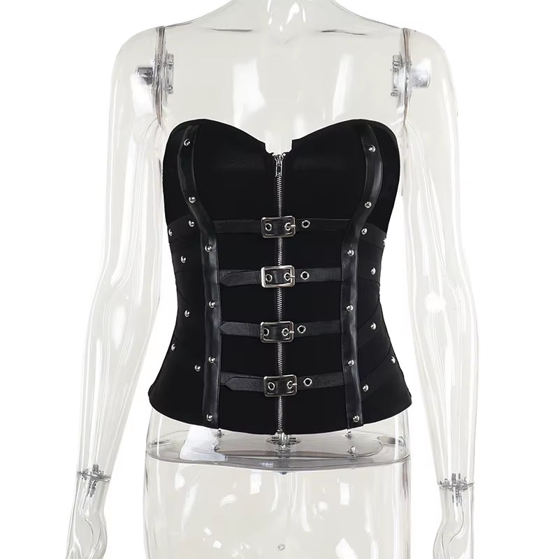 Black leather punk grunge corset top with buckle straps, Y2K coquette gothic streetwear style, worn as a statement vest.