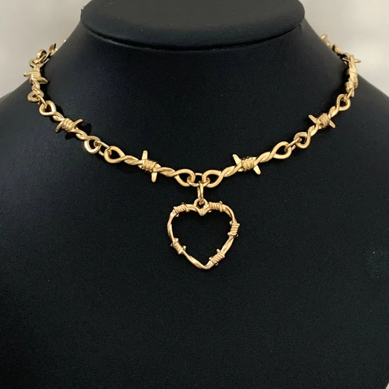 Gothic heart choker necklace with barbed wire design, hip-hop inspired jewelry for women, featuring edgy, bold style.