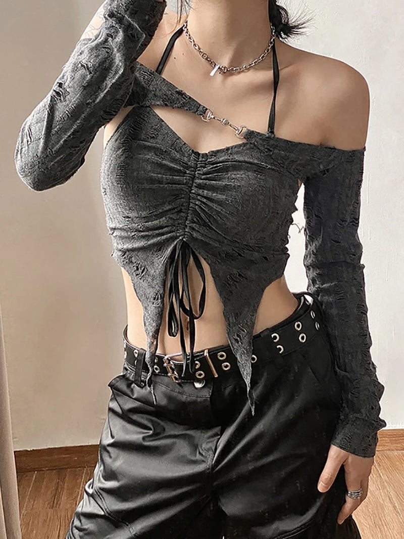 Vintage mall gothic 2-piece Y2K grunge T-shirt and camisole set with long sleeves and buckle crop top, styled for a chic look.